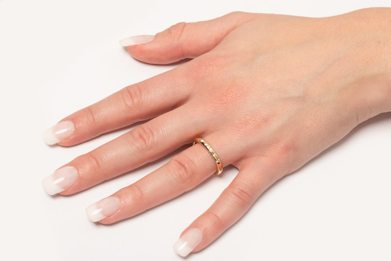 Elegant Elsa Peretti® Stacking Band Ring in 18k yellow gold, embodying simplicity and sophistication