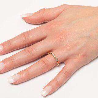 Elegant Elsa Peretti® Stacking Band Ring in 18k yellow gold, embodying simplicity and sophistication
