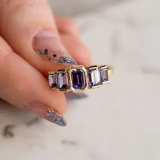 Oma Jewelry Juno Ring: 1.63 ct purple tanzanite emerald-cut stones in a 14k gold band