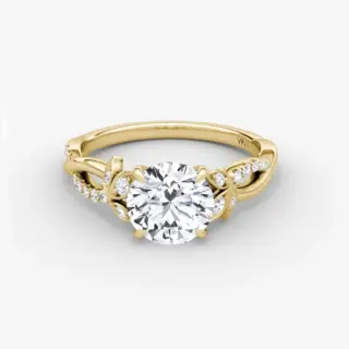 Twisted floral engagement ring by VRAI with round brilliant lab-grown diamond in 18k white gold