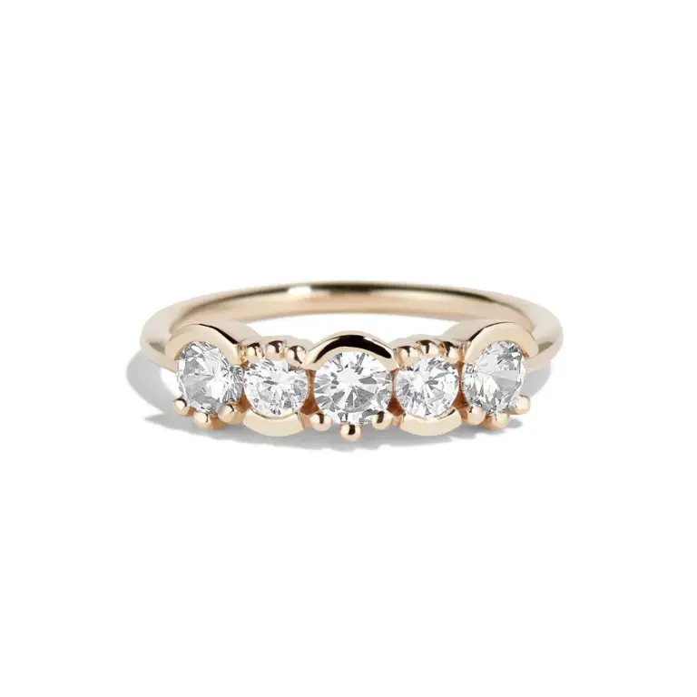 Lash Linear Diamond Ring on a finger—contemporary line of diamonds in lash setting highlighting understated ethical luxury.