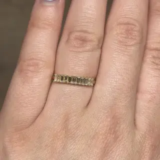 Filigree Jewelers .66 ct natural baguette diamonds set with shared prongs in a sleek 14k yellow gold stacking ring