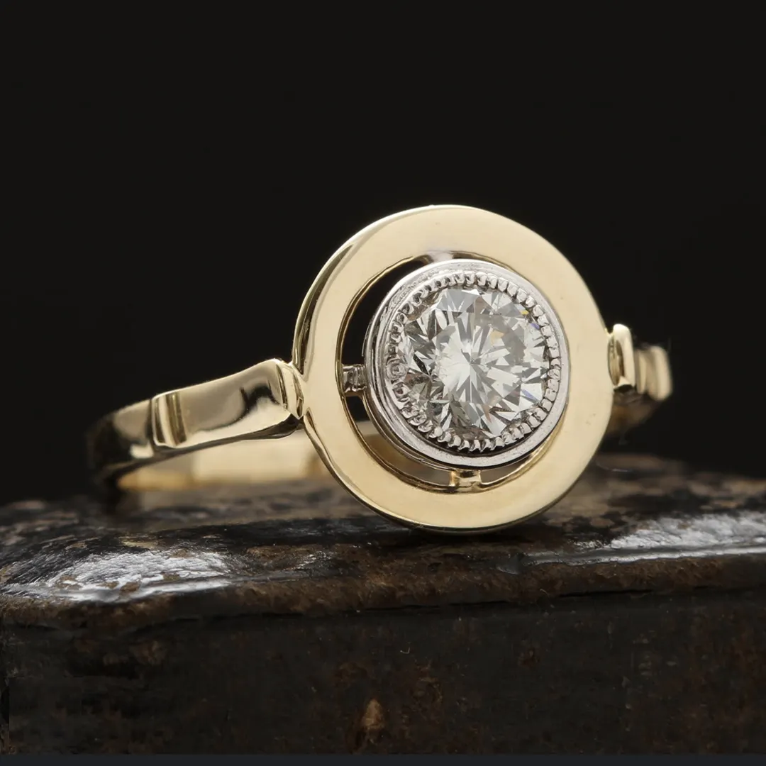 Erica Weiner Omphalos solitaire ring in two-tone 18k gold featuring a ~0.50 ct old European‑cut diamond in a milgrain white‑gold bezel and yellow‑gold halo.