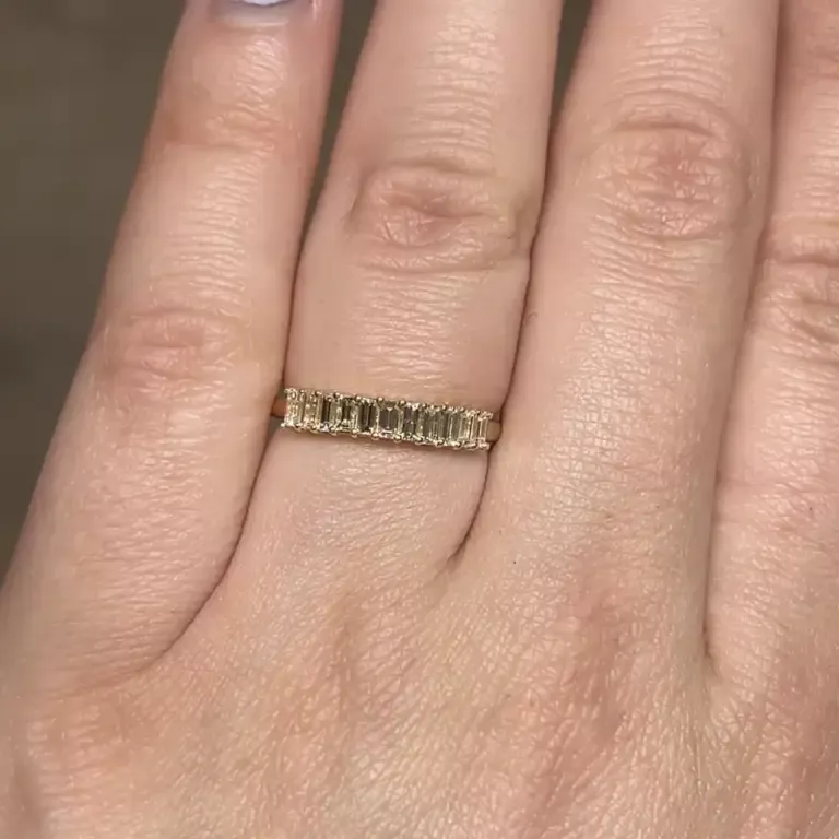 Filigree Jewelers .66 ct natural baguette diamonds set with shared prongs in a sleek 14k yellow gold stacking ring