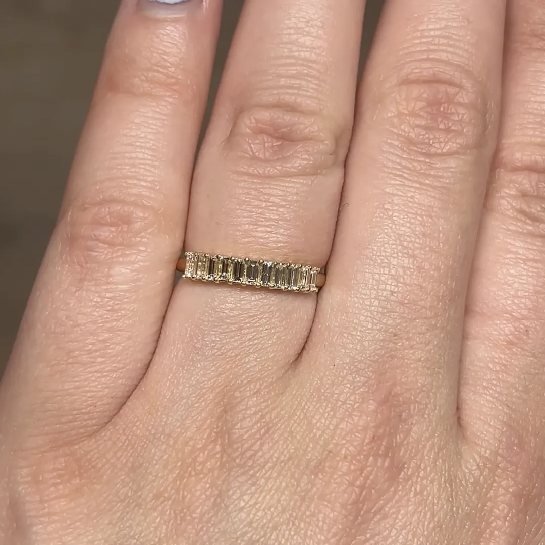 Filigree Jewelers .66 ct natural baguette diamonds set with shared prongs in a sleek 14k yellow gold stacking ring