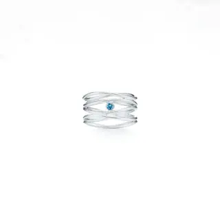 Tiffany Elsa Peretti Wave three‑row 18 kt gold ring with central round brilliant diamond (0.05 ct), featuring fluid wave‑shaped bands.