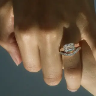 Handcrafted emerald‑cut diamond Cosma Ring in platinum with minimalist octagonal bezel—emulates the stone’s silhouette