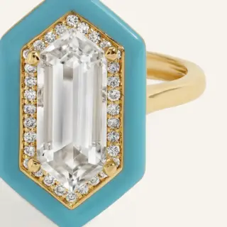 Light Blue Yadira ring in 14 k gold with a 1.5 ct white topaz center, 0.12 tcw VS G‑H diamonds, and a light blue enamel border on a 2 mm band