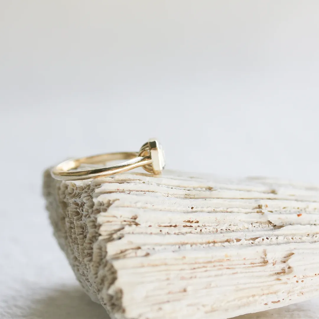 JP Gild 14 kt recycled yellow gold ring with 1.15 ct salt and pepper Asscher‑cut diamond in an open‑bottom cathedral bezel