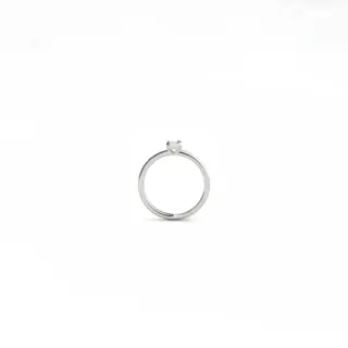 Minimalist bezel‑set lab emerald ring in 14 k white gold, stackable or solo wear, crafted by hand in New York