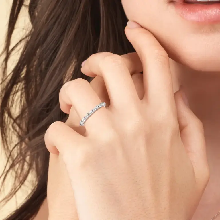 14k white gold Vintage Baguette Halo Solitaire Wedding Band featuring a central round diamond surrounded by a halo of baguette diamonds, offering a timeless and elegant design