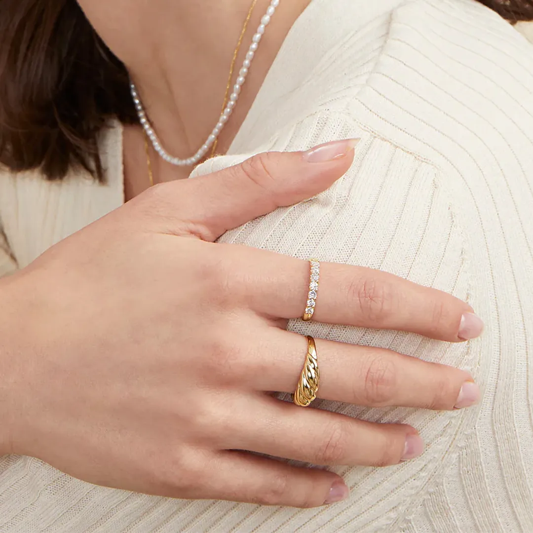 Mejuri's Bold Diamond Half Eternity Ring: 0.43 ct of ethically sourced diamonds set in a polished 14k yellow gold band