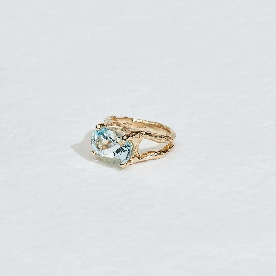 Nature-inspired JP Aquamarine Branch Ring by Jane Pope Jewelry with a 4.75 ct oval aquamarine and organic textured band in recycled yellow gold.