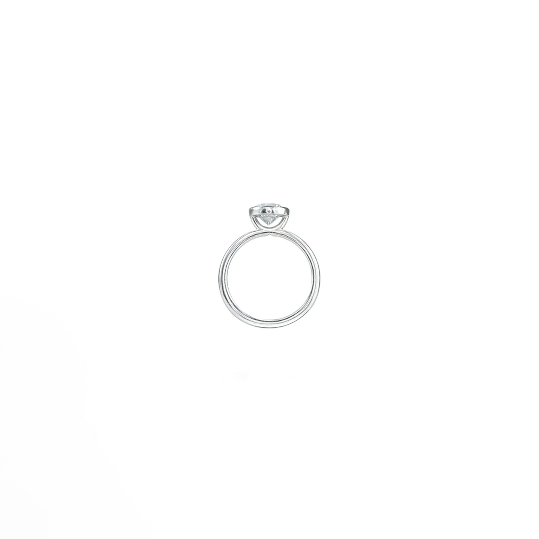 Mark Patterson platinum ring with open-sided bezel, offering a modern design to showcase your chosen center stone
