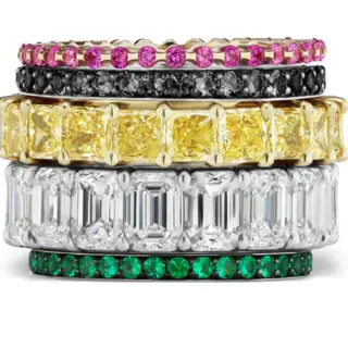 Serpentine Jewels Emerald Cut Half Eternity Band: 18K white gold ring adorned with emerald cut diamonds and multicolored sapphires, perfect for stacking or as a wedding band.