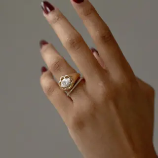 Flora East-West Oval Ring by June Rings: a modern heirloom piece with a 1.75-carat oval center stone in 14k gold.