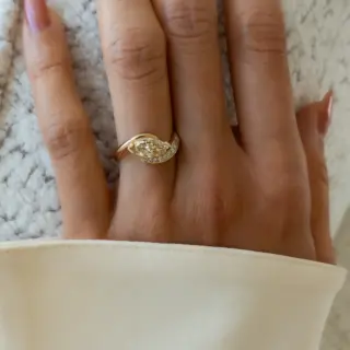 Side profile of handcrafted yellow diamond rapture ring showcasing pavé band