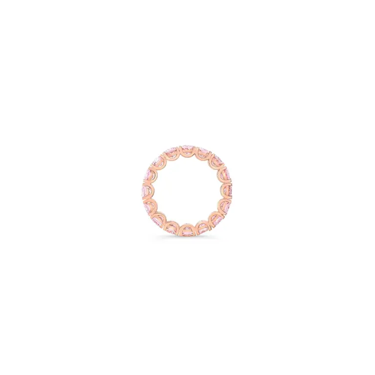 Elegant engagement ring featuring oval morganite stones in a continuous eternity band design.