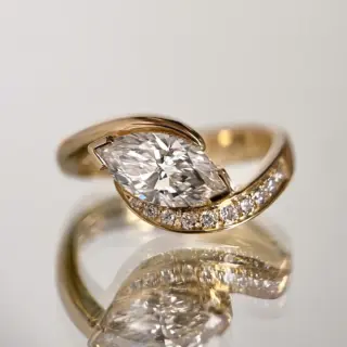 Model wearing marquise yellow diamond ring by Cadette Jewelry