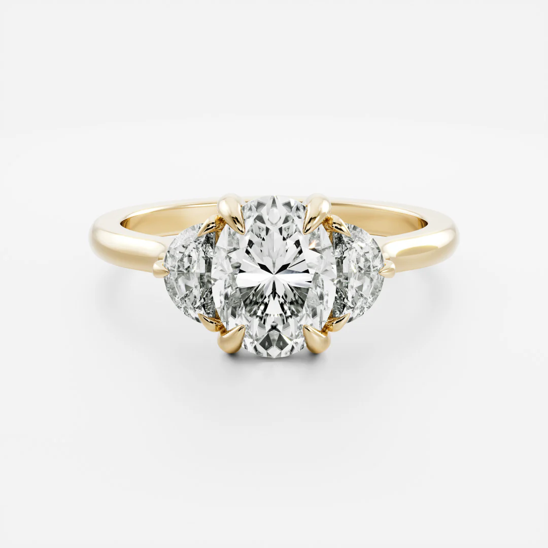 Close-up of the Anya Ring, showcasing its oval and half-moon diamond trilogy set in 14k gold