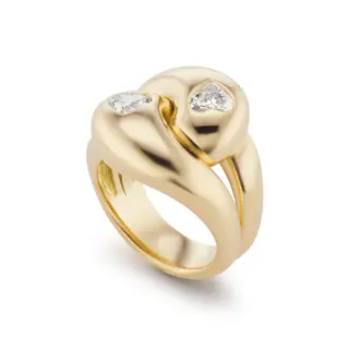 Brent Neale 18K yellow gold Knot Ring featuring two heart-shaped diamonds totaling 0.80cttw, designed in a sculptural knot motif.