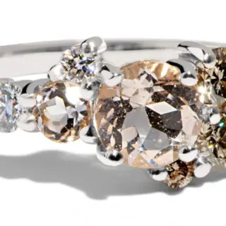 Bario Neal Burst Cluster Morganite Ring: 5mm morganite center with champagne and white diamonds, prong set in 14kt yellow gold.