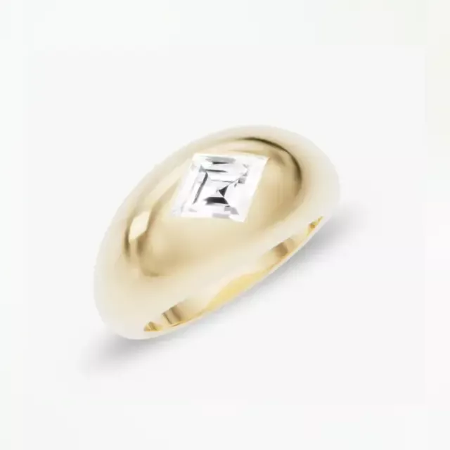 Close-up of VRAI’s Lozenge Dome Band Ring, showcasing the high-polish finish and contemporary silhouette in solid yellow gold.