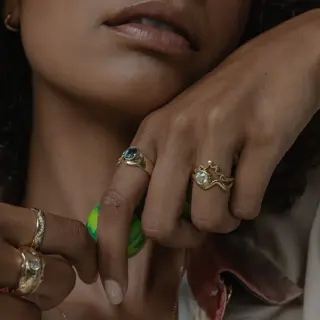 Model wearing the Old Euro White Diamond Drift Engagement Ring, emphasizing its unique design and timeless appeal.