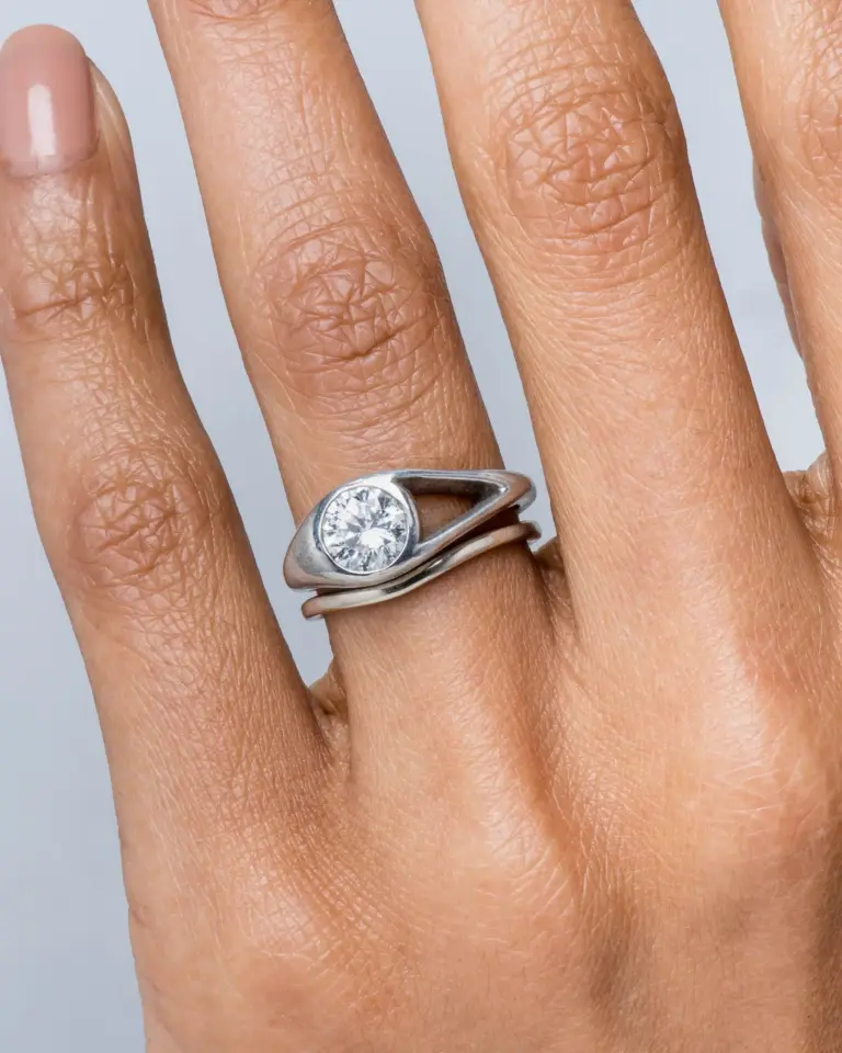 Side view of Aira Diamond Ring showing 0.50 ct diamond and adjacent open-space design