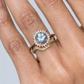 Stellium Ring by Bario Neal – oval aquamarine center stone with ethical diamond halo in 14k gold