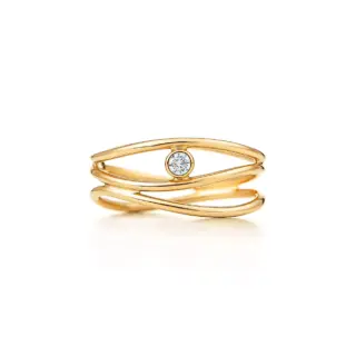 Minimalist Elsa Peretti Wave ring in 18 k gold featuring organic curved bands and a central round brilliant diamond accent