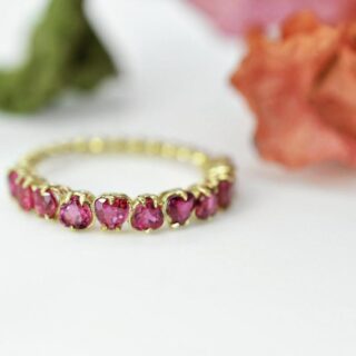 Heart-shaped ruby eternity band by Anye Designs, available in 14K or 18K gold or platinum