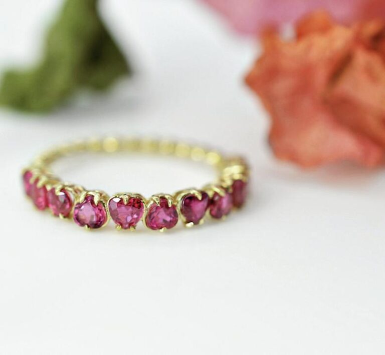 Heart-shaped ruby eternity band by Anye Designs, available in 14K or 18K gold or platinum