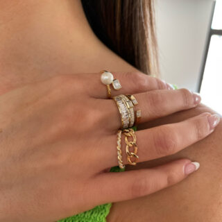 Unique 0.92ct baguette diamond ring in white, yellow, or rose 14k gold, perfect for engagement or special occasions.