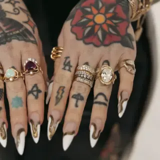 14k gold Florence Ring by Marrow, featuring a bezel-set oval lab diamond with sculptural twisted side design, inspired by personalized storytelling