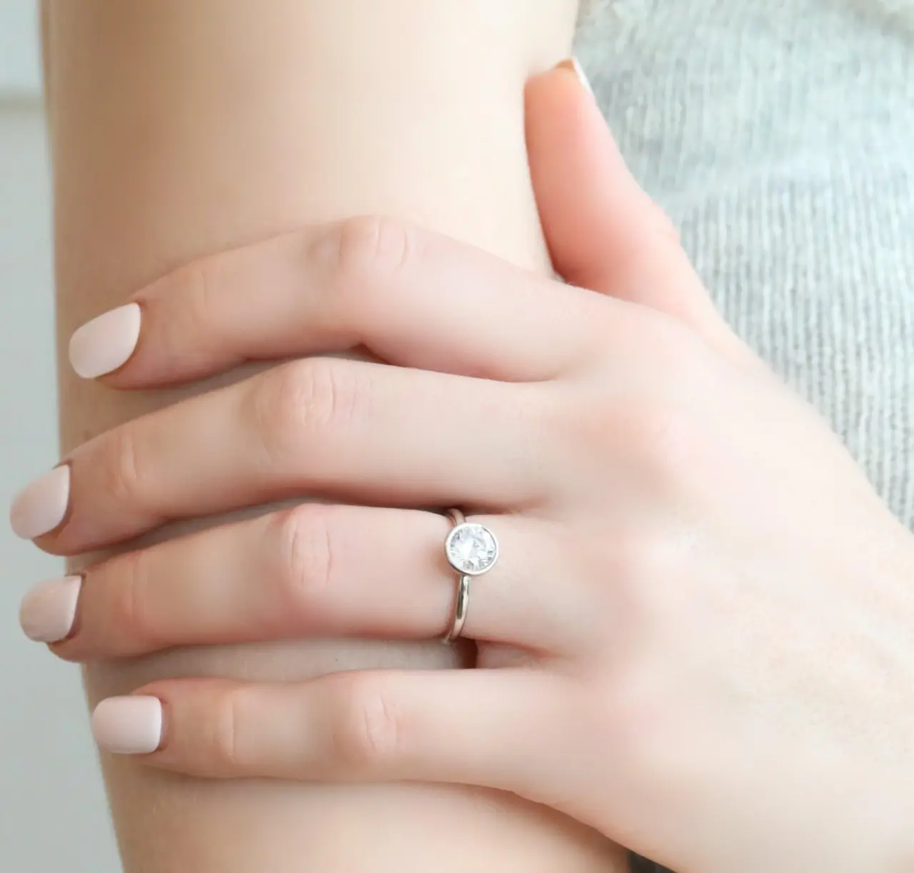 Customizable Mark Patterson platinum ring mount with a high-polish finish and unique open-sided bezel setting