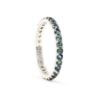 Minimalist Green Sapphire Eternity Ring by Elliot Gaskin, made with recycled 14k gold and ethically sourced stones