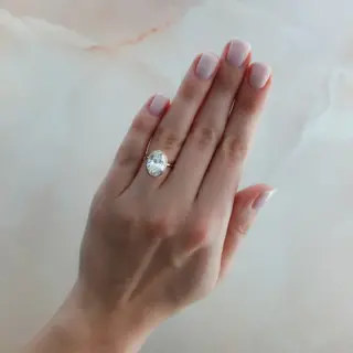 Elegant Penumbra Bezel Engagement Ring with 4.51ct lab-grown oval cut diamond, set in 18k white gold, designed for contemporary sophistication