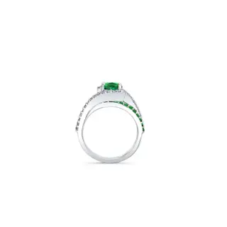 Side angle of Barkev’s tsavorite engagement ring revealing the elegant bridge design with tsavorite accents and fine craftsmanship in 14K white gold.