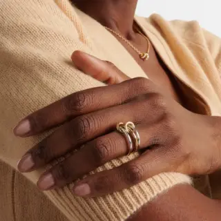 Sonja Ring by Spinelli Kilcollin – multi-band linked ring in mixed 18k yellow, rose, and white gold