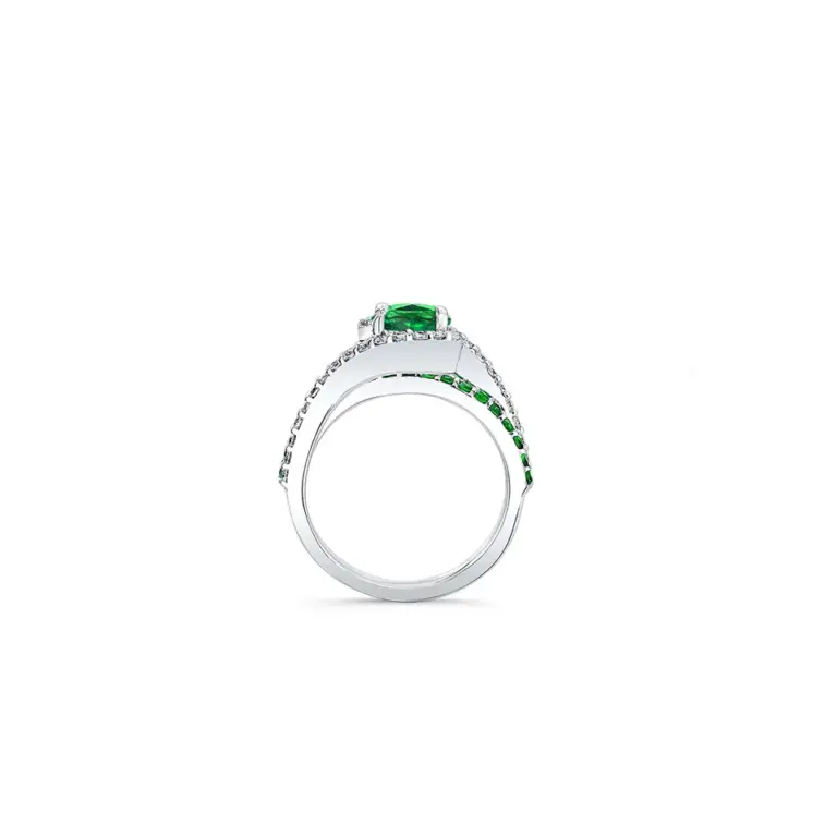 Side angle of Barkev’s tsavorite engagement ring revealing the elegant bridge design with tsavorite accents and fine craftsmanship in 14K white gold.