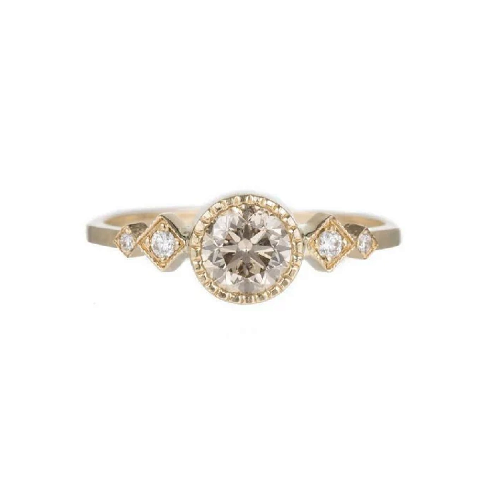 Delicate 14k gold solitaire ring with warm champagne diamond – minimalist heirloom design