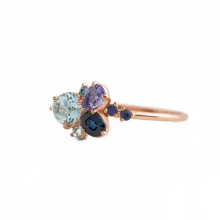 Clear Water Ring by Melanie Casey – oval aquamarine center stone with diamond accents in 14k gold