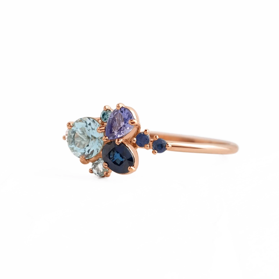 Clear Water Ring by Melanie Casey – oval aquamarine center stone with diamond accents in 14k gold