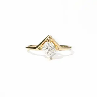 Princess Cut Diamond Nestled Ring by Wwake – delicate 14k gold band with princess cut diamond centerpiece