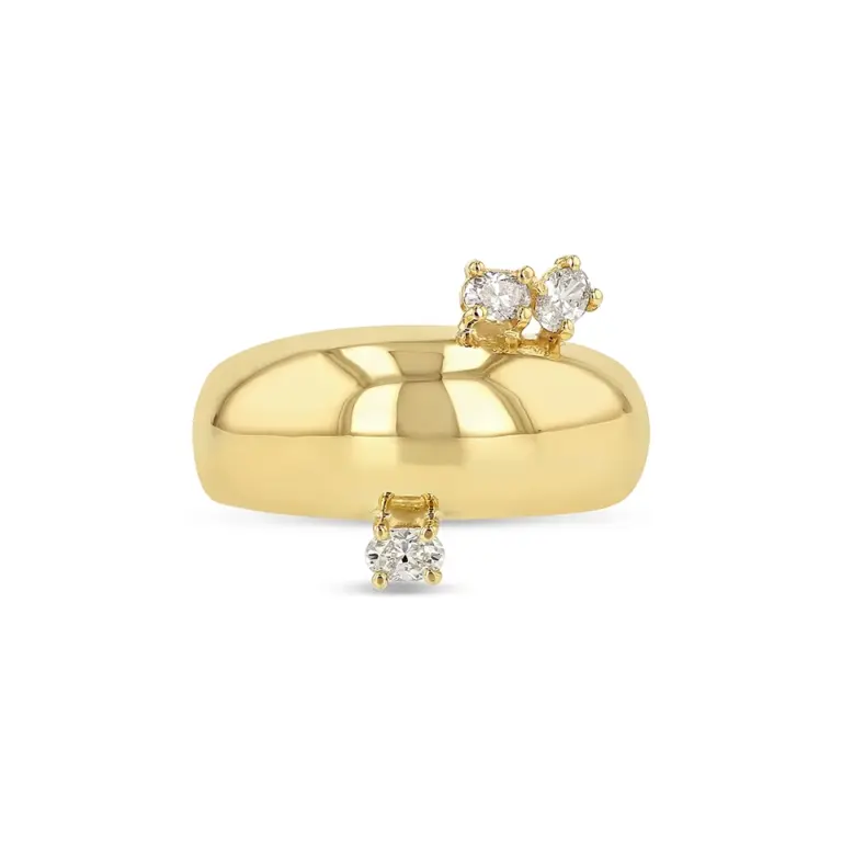 Close-up of Demi Globe Plus 3 Ovals Ring showing the trio of oval diamonds set on a domed gold band.