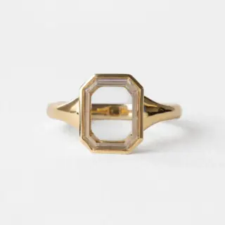 Detailed view of the Maren Portrait Bezel Emerald Ring's underside, showcasing the craftsmanship and solid gold construction.