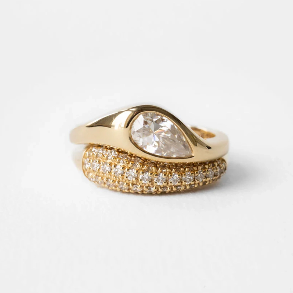 Close-up of the Marlow East-West Pear Ring showcasing a 0.95 ct pear-shaped stone set horizontally in a 14k gold domed band.