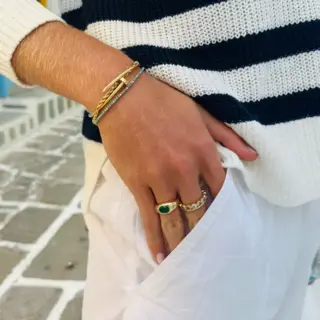 14k/18k gold dome ring featuring oval emerald cut diamond – modern luxury fine jewelry