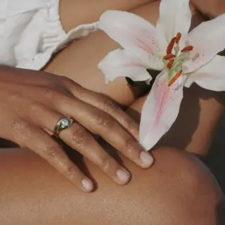 Emmeline engagement ring with round gray diamond and curved gold band by Seaworthy PDX